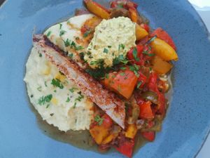 Main dish with polenta, bell peppers, and an "eggy" smoky tofu paste at Totum Cantine Bio in Nantes