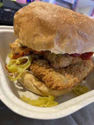 Tofu fried chick’n, avocado, spicy pepperoncini, roasted red peppers, & Alabama white bbq at Orchard Grocer in New York City