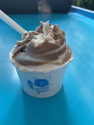 Vanilla and Mexican hot chocolate soft serve (half eaten)   at Orchard Grocer in New York City