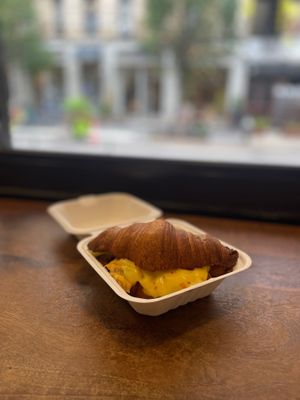 The Miles: just egg, bacon, provolone, chives and mayo on a croissant at Orchard Grocer in New York City