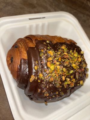 Pistachio and chocolate croissant (not much pistachio and none at all inside)   at Orchard Grocer in New York City
