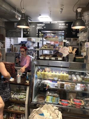 The ordering counter and kitchen at Orchard Grocer in New York City