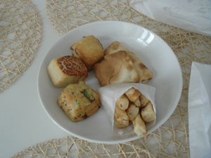 "French fries", "mushroom ravioli", "egg roll", and 3 types of pogacsa at Fill Good in Budapest