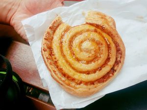 Someone couldn't wait to take a bite. Apricot and walnut pastry at Fill Good in Budapest