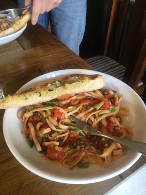 Linguini pasta with tomatoes and capers (sorry I forgot the name of the dish) this was a child’s portion. Very tasty.  at Aysgarth Falls Hotel Pub in Aysgarth