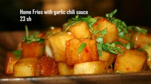 Home Fries with garlic chili sauce at Veggies Bar in Jerusalem