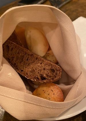 Fresh baked bread basket that comes with dinner plates. at Montero's Restaurant & Bar in Elizabeth City