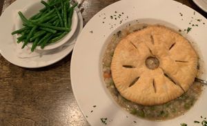 Veggie Pot Pie w/ side of fresh green beans. (*Veggies are diced fresh in this dish & not frozen according to our waiter). at Montero's Restaurant & Bar in Elizabeth City