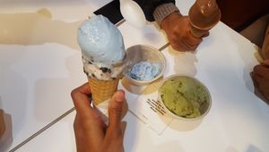 All of these are vegan. The blue is birthday cake, the green is matcha, the brown is chocolate, the cone also has cookies and cream at BRICS in Indianapolis