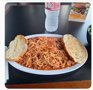 Spaghetti and bread at Sankofa Kitchen in Dallas
