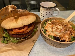 Burger and coleslaw  at Swing Kitchen - Josefstadt in Vienna