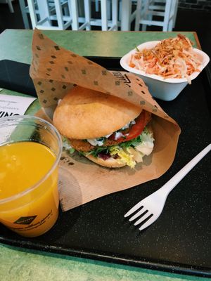 Vienna burger & cole slaw & orange juice at Swing Kitchen - Josefstadt in Vienna
