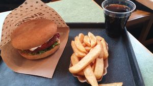 burger, chips and swing cola at Swing Kitchen - Josefstadt in Vienna
