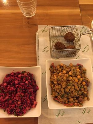 Beet and lentil salads with a side of falafel. at Umi Falafel in Cork