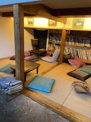 Some of the seating spots, books!  at Cafe Stay Happy in Tokyo