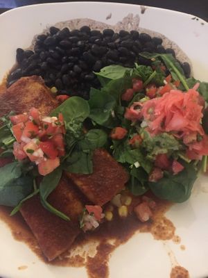 Vegan enchiladas, black beans, spinach salad at Tamaliza in Sedona