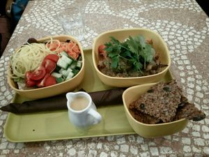 Bowl with raw crackers at World Food Barn in Paris