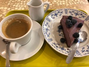 Raw cake and coffee at World Food Barn in Paris
