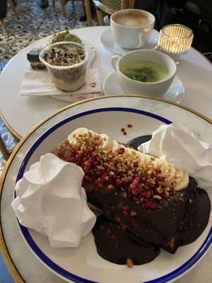 Sweet waffle & matcha for me, brunch plate &  ginger coffee for him.  at Oslo Raw - Adamstuen Torg in Oslo