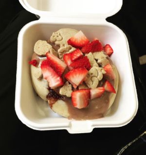 Chocolate frosting, graham crackers and strawberries! Courtesy of @veganbadboy on Instagram. at Cinnaholic in San Diego