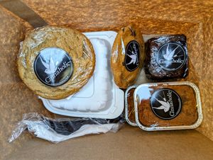 Chocolate chip cookie, Cinnadoodle cookie, brownie, pumpkin bread, and (in the white container) a pumpkin cinnamon roll. at Cinnaholic in Meridian