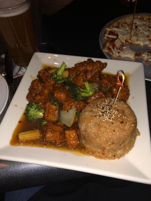 Orange chicken with spicy rice and added broccoli  at Yard House in Brookline