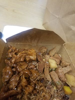 BBQ CHICKEN, PEPPER STEAK ON TOP OF RICE AND BEANS. at Sun Life Total Health  in Bronx