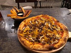 Smokey pizza and sweet potato fries   at The Organik Kitchen Saigon in Ho Chi Minh City