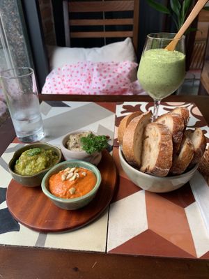 Spur dough, dips, and a smoothie. at The Organik Kitchen Saigon in Ho Chi Minh City