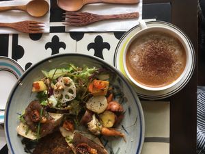 Brunch platter, latte at The Organik Kitchen Saigon in Ho Chi Minh City