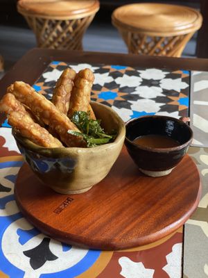 Tempeh sticks with lime leaves and BBQ sauce  at The Organik Kitchen Saigon in Ho Chi Minh City