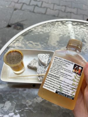 Water kefir and ginger tumeric shot  at Khun Kae's Juice Bar in Chiang Mai