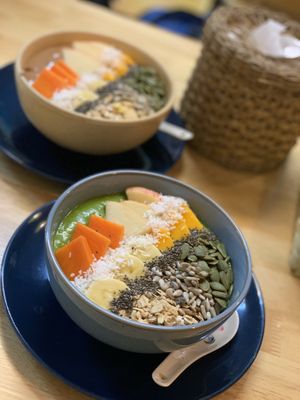 Green smoothie (front) and chocolate smoothie bowl (back) at Khun Kae's Juice Bar in Chiang Mai