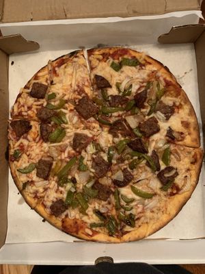 Cauliflower crust pie with vegan cheese, beyond meat sausage and peppers and onions 👌🏼so good at Pazzo Wood Fired Pizza in Wading River