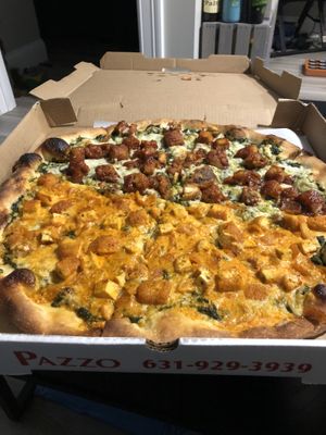 Half Buffalo tofu and half bbq tofu pesto pizza 🤤  at Pazzo Wood Fired Pizza in Wading River