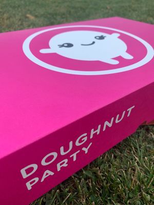 Ordered online and were ready for me in this neat box at Doughnut Party in Edmonton