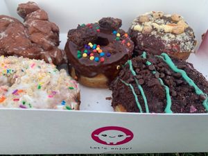 Half a dozen can serve many! 

Not overly sweet, therefore I enjoyed the craving :) at Doughnut Party in Edmonton