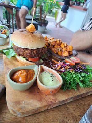 Burger with sweet potato fries 👌 great patty + green garlic aioli on the side at Pure Vegan Heaven in Koh Phangan