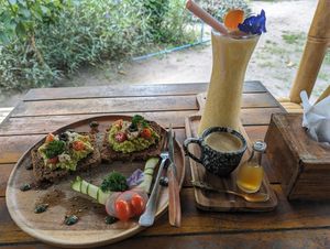 Avocado Feta toast, black coffee and a Rise and Shine smoothie. at Pure Vegan Heaven in Koh Phangan