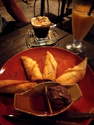 Banana fritters and raw avocado chocolate mousse.  at Pure Vegan Heaven in Koh Phangan