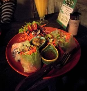 Raw vegetable spring rolls with tempeh and salad side.  at Pure Vegan Heaven in Koh Phangan