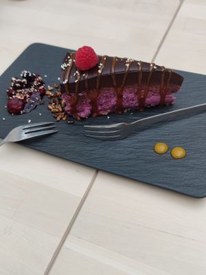 Chocolate and red fruits raw vegan cake at Pure in Luxembourg City