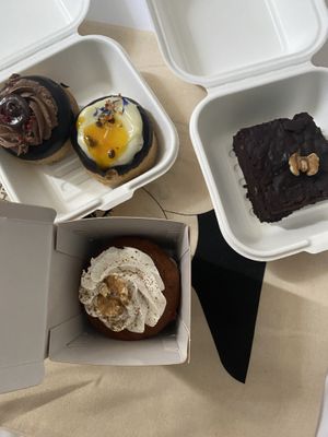 Carrot cake muffin, brownie, passion fruit and chocolate donut   at Chök in Barcelona
