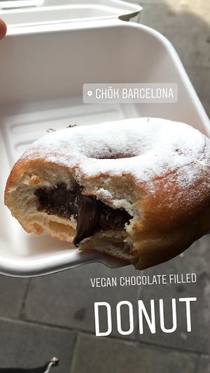 Chok Barcelona - Vegan chocolate filled doughnut topped with icing sugar at Chök in Barcelona