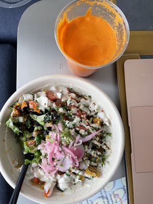 Brekkie bowl with fresh juice at Vibe Organic Kitchen & Juice in Newport Beach