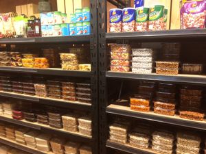 Vegan fruits and nuts and canned products at Cedar Bakery in Preston