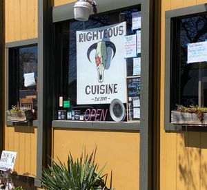 Front window (during Covid19) at Righteous Cuisine in Grand Haven
