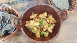 mushrooms in a garlic white wine sauce at Inspiracion 9 in Tijuana