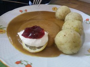 "Svíčková" - typical Czech gravy with tempeh, dumplings, (vegan) cream and cranberries at U Zelenina in Prague