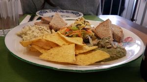 a selection of starters - Hummus, Pesto Zucchini, no-egg salad at U Zelenina in Prague